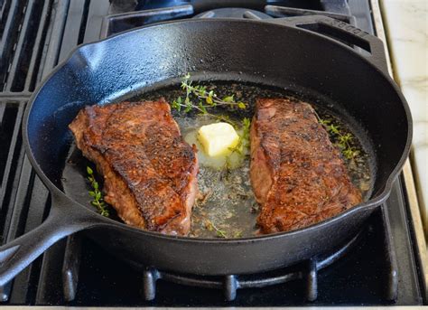 searing steak on top of gas stove